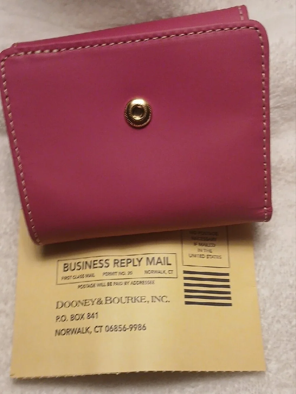 Dooney & Bourke Rose Pink Leather Compact Wallet with Gold Plaque
